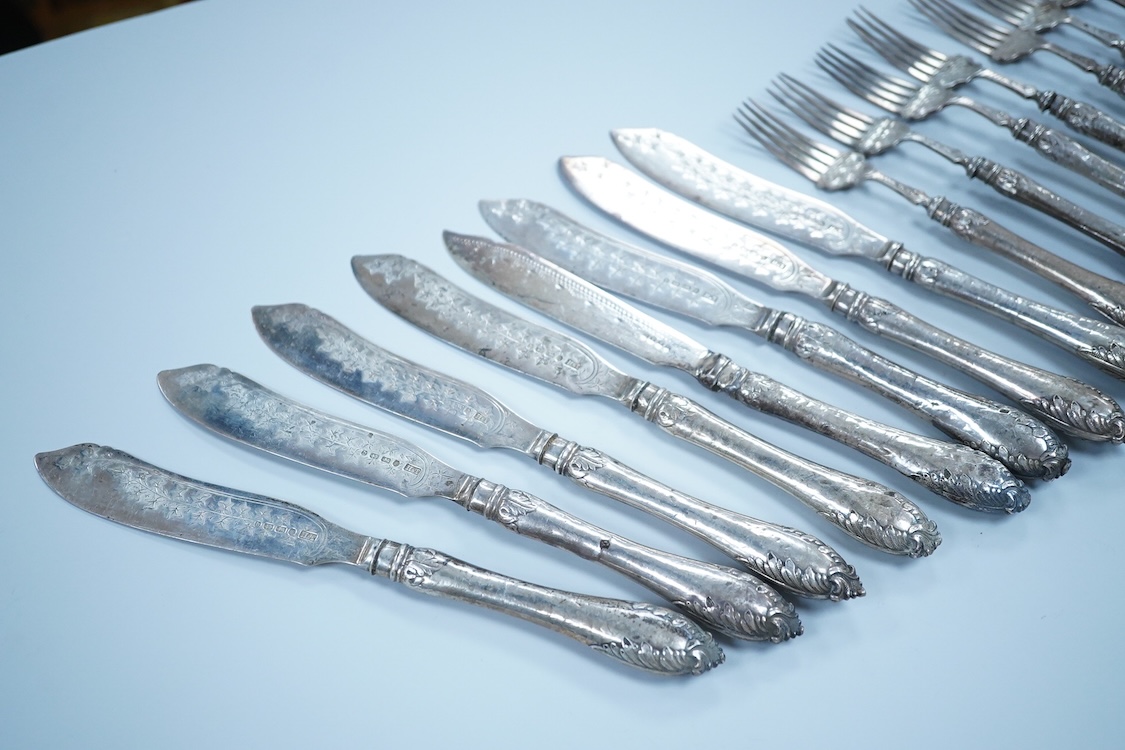 Eight Victorian silver fish forks and seven fish knives, by Hilliard & Thomason, Birmingham, 1878, with loaded unmarked white metal handles, one a plated replacement.